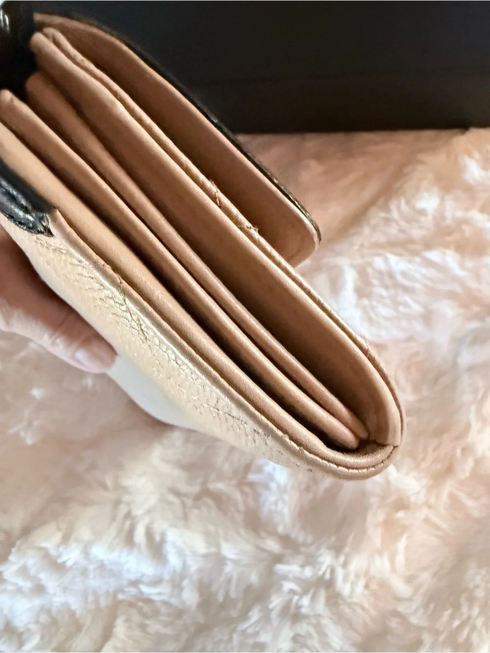 CHANEL Filigree Beige Quilted Leather Wallet with Black Trim and Gold Accents